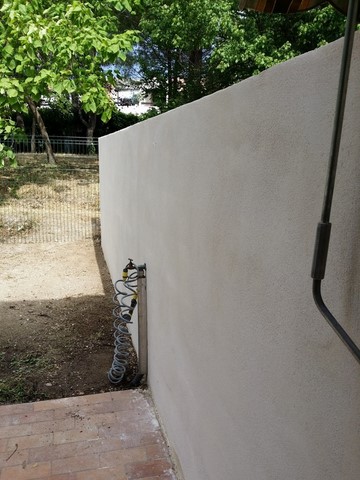 cloture mitoyenne enduit