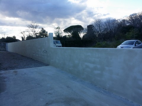 mur de cloture enduit